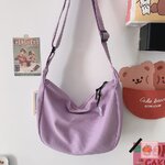 กระเป๋าสะพายข้าง ทรงเกี๊ยว ใส่ไอแพดได้ สีม่วง ราคา 79