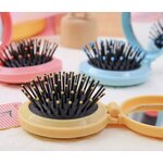 (ของแถม) แปรงหวีผมกระจกพับพกพา สีพาสเทล