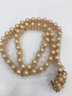 เข็มขัดมุกสีทอง