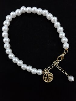 สร้อยข้อมือมุกห้อยกลม