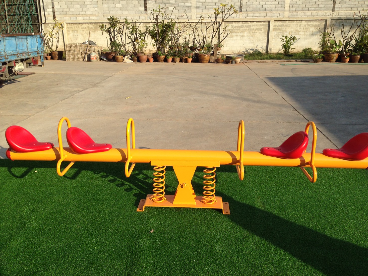 ไม้กระดกสปริง 4 ที่นั่ง สีเหลือง