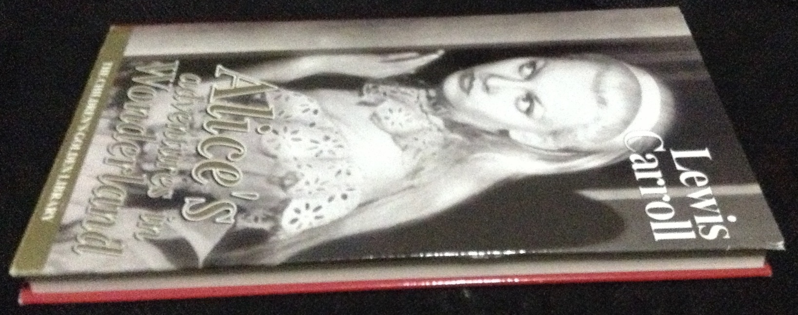 Alice's Adventures in Wonderland Hardcover ราคา 270