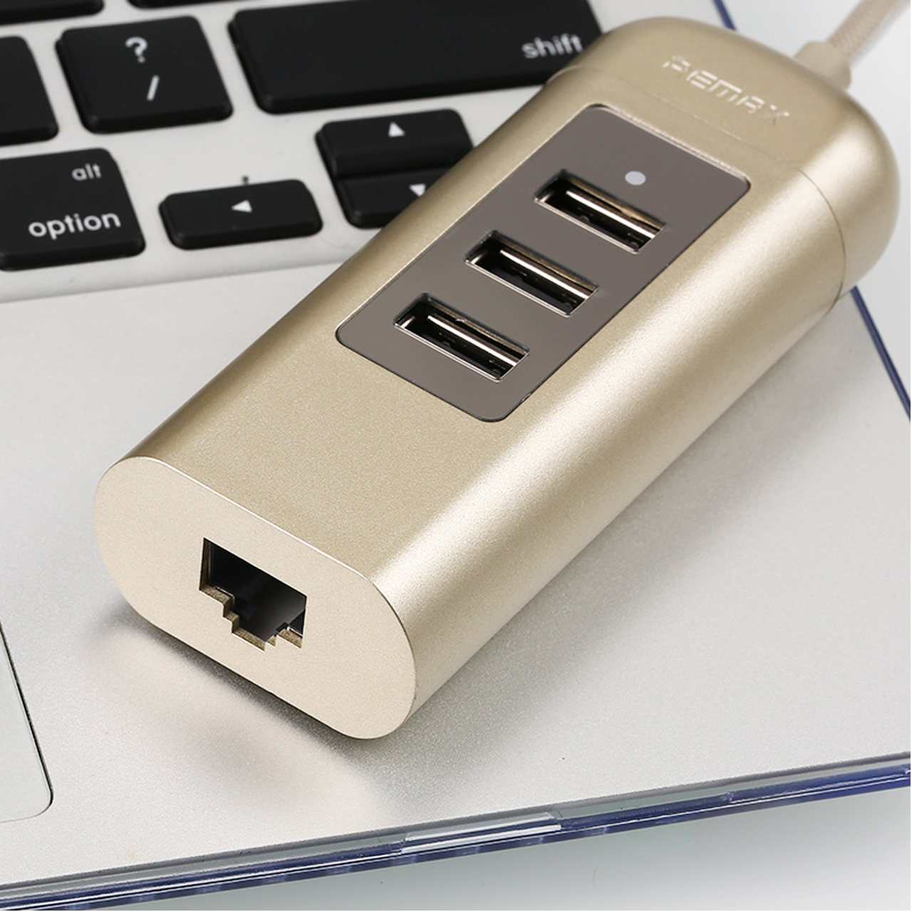 รางปลี๊กไฟ Remax HUB RU-U4 3USB 2.0 สีเงิน