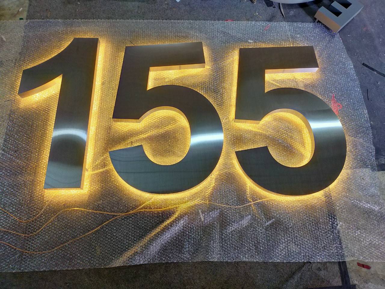 งานป้ายไฟออกหลัง 155