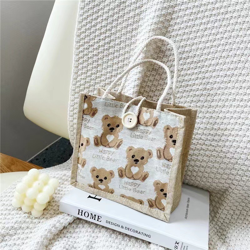 กระเป๋าถือแฟชั่น ลายหมี ราคา 25