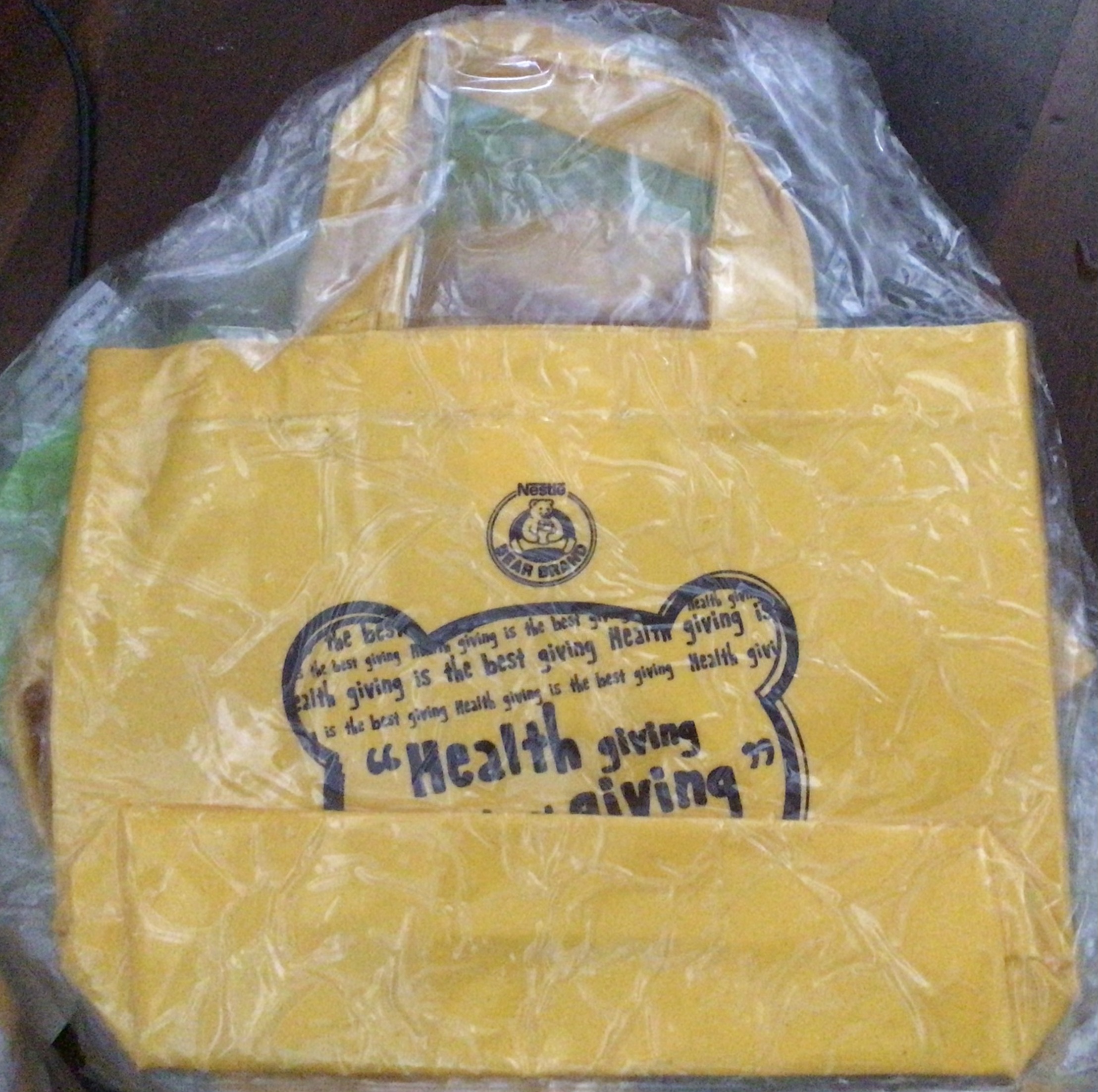 (ของแถม) กระเป๋าถือสีเหลือง