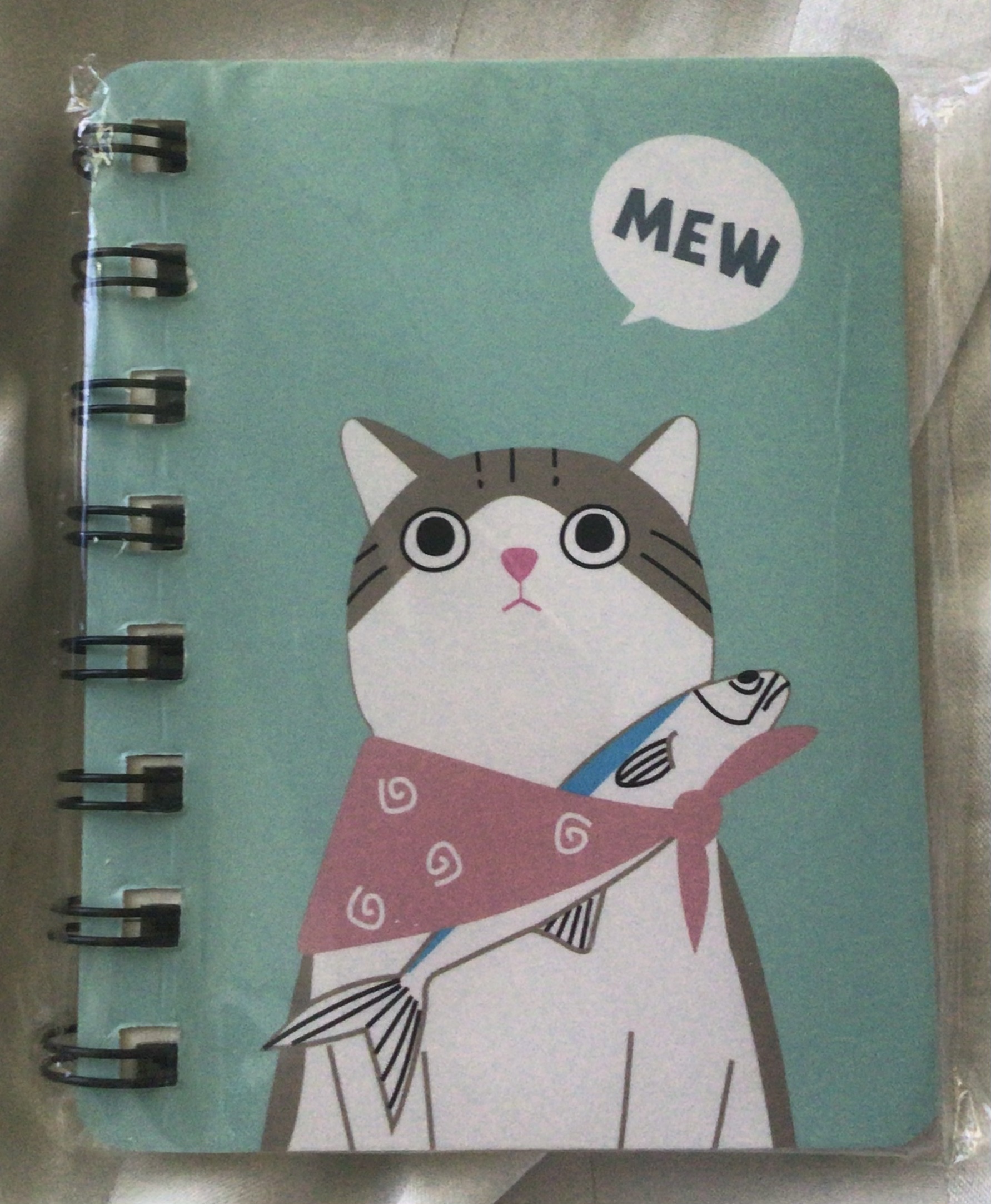 สมุดโน้ตสันห่วงa7 ปกแมว พื้นเขียว ราคา 20