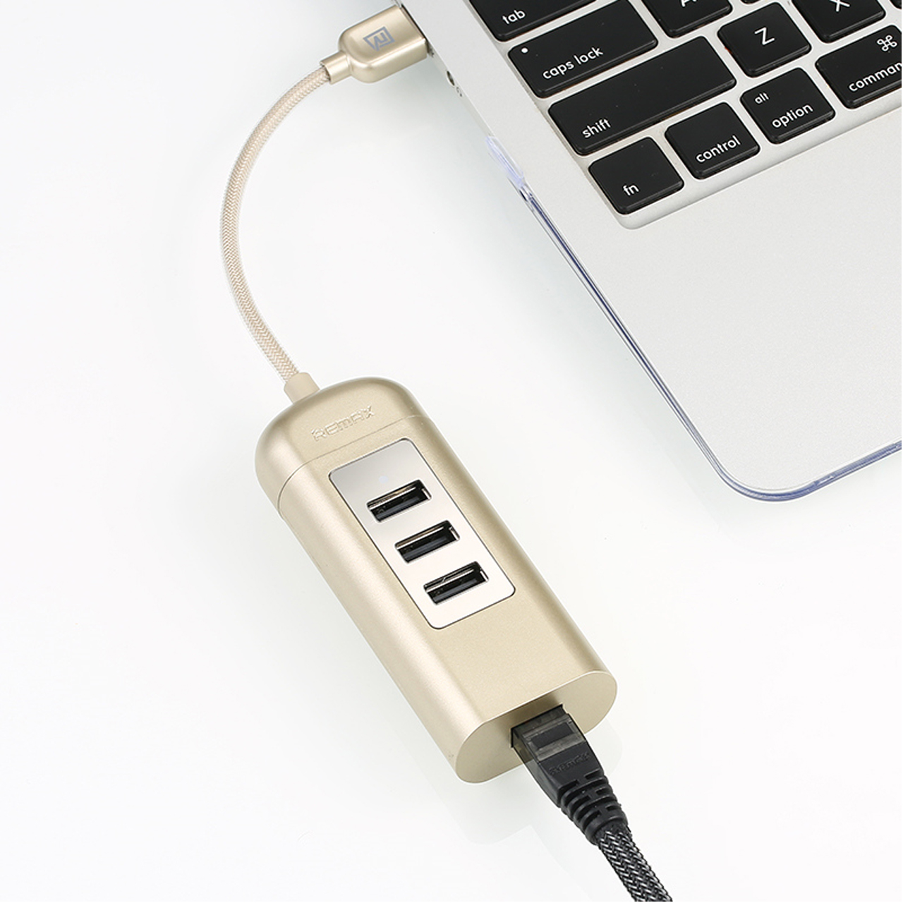 รางปลี๊กไฟ Remax HUB RU-U4 3USB 2.0 สีเงิน