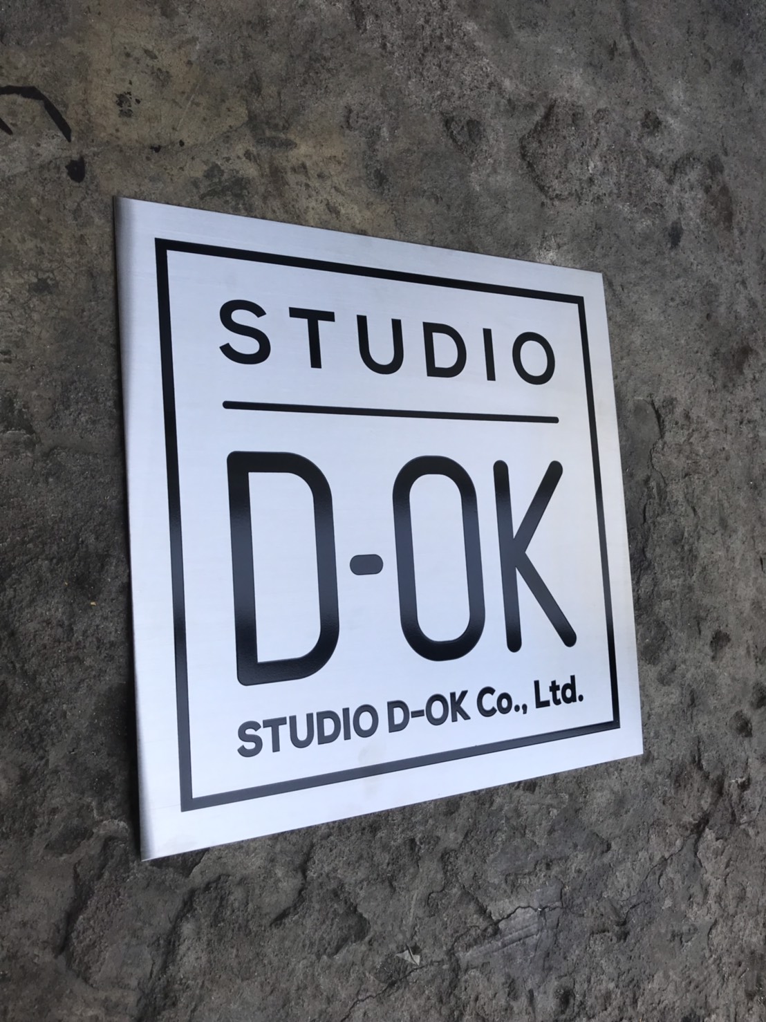 ป้ายแสตนเลสกัดกรด #STUDIO D-OK Co.,Ltd. #ป้ายบริษัทกัดกรด