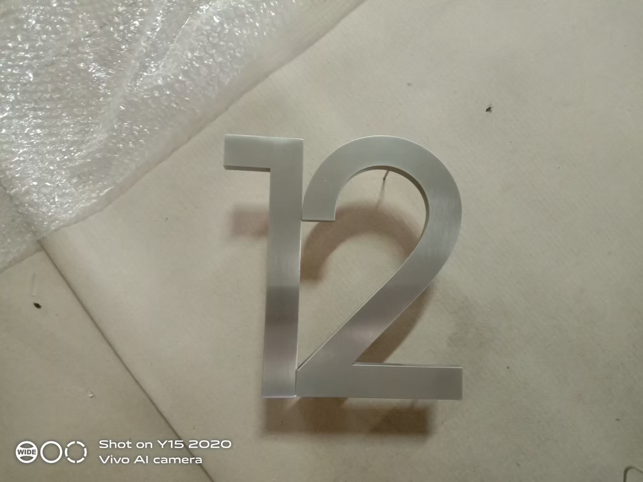 งานป้ายบ้านเลขที่12