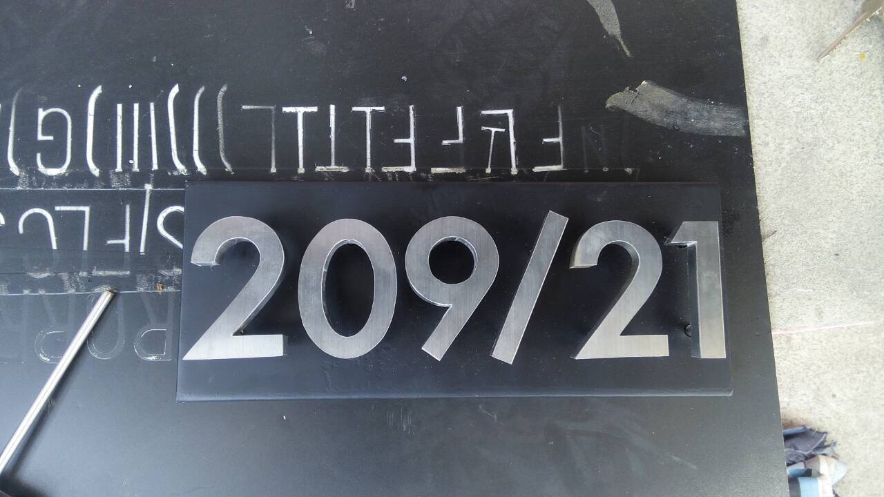 ป้ายบ้านเลขที่ 209/21