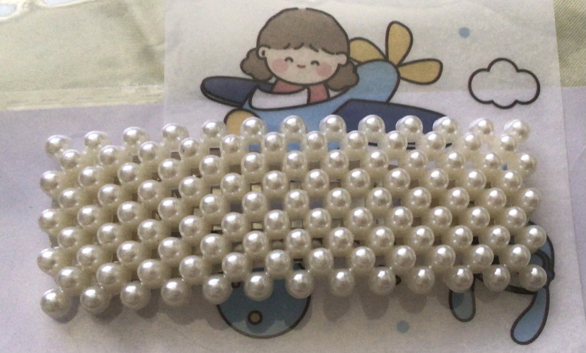 (ของแถม) กิ๊บติดผมมุกขาว 3ชิ้น สุ่มลาย