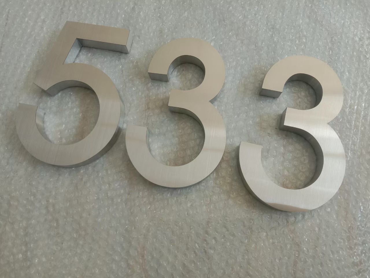 งานป้ายบ้านเลขที่ 533