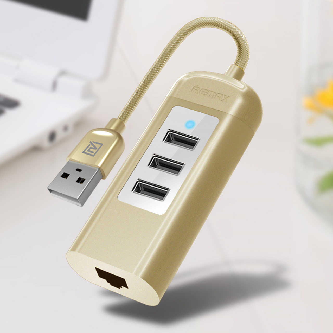 รางปลั๊กไฟ Remax HUB RU-U4 3USB 2.0 สีทอง