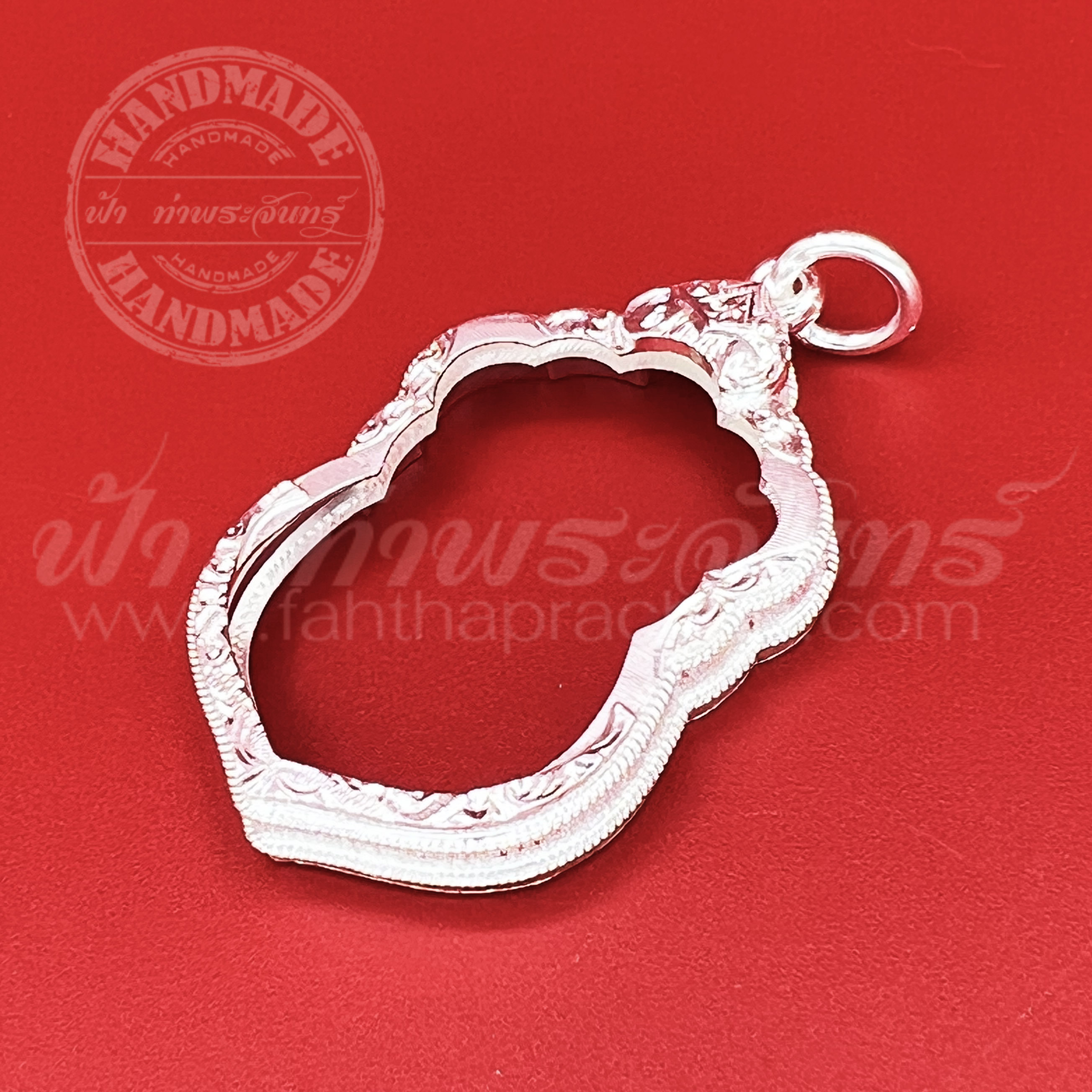 เลี่ยมจับขอบ เหรียญวัดหนัง เงินแกะลาย 92.5%