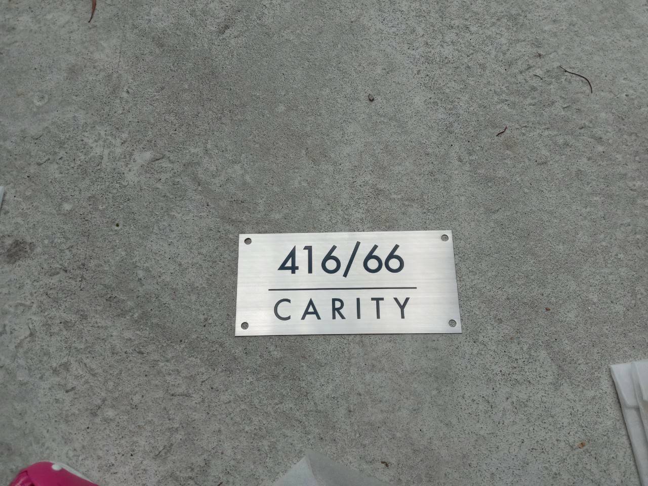 งานป้ายสแตนเลสกัดกรดบ้านเลขที่ 416ทับ66 CARITYจะมุม 4 รูตามแบบ